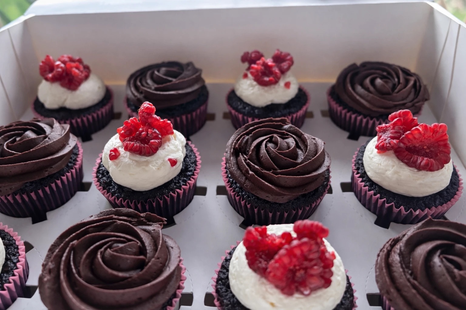 A gift box of Christmas cupcakes