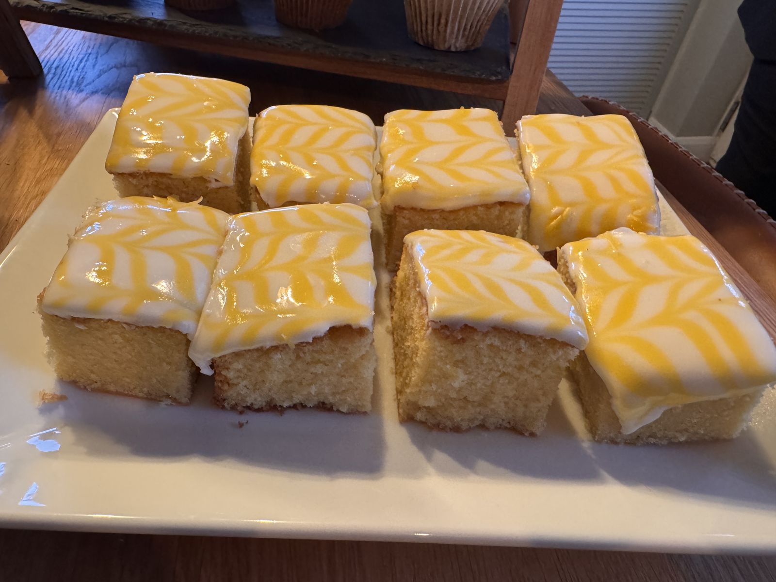 Iced lemon traybake cut into squares
